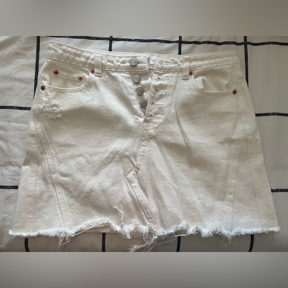 White jean skirt by Vestique.